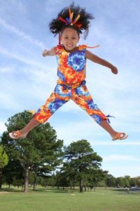 Young girl jumping